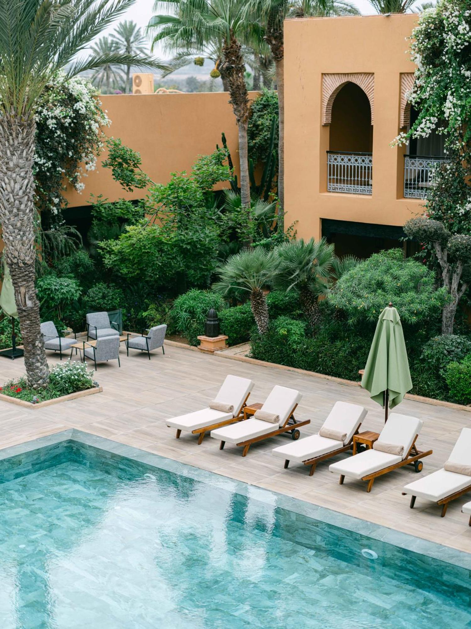 Tikida Golf Palace Agadir Exterior foto The pool at the hotel